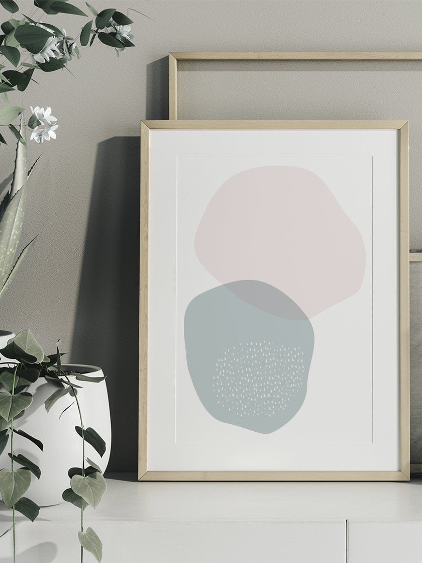 blue-and-pink-circle-pastel-shapes-poster-in-interior